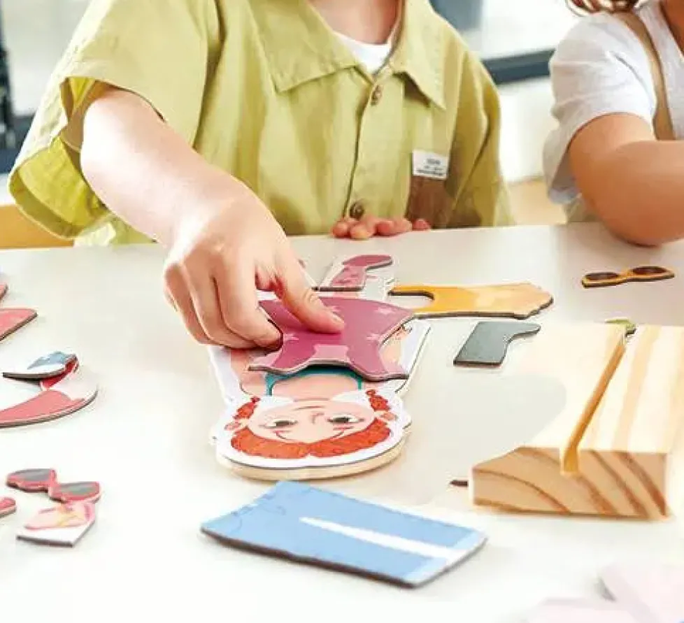 Hape Magnetic Seasons Dress Up Wooden Puzzle